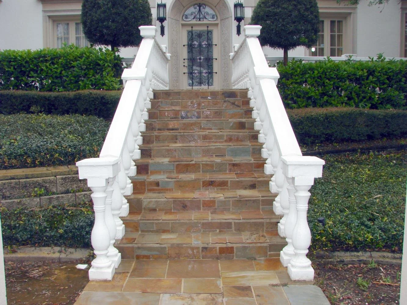 Clean sidewalk and curbing after pressure washing in Belleair, FL
